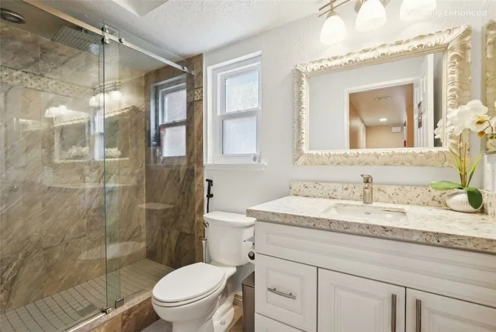 Virtually Enhanced to give an idea of what the rooms would look like with neutral colors and design.