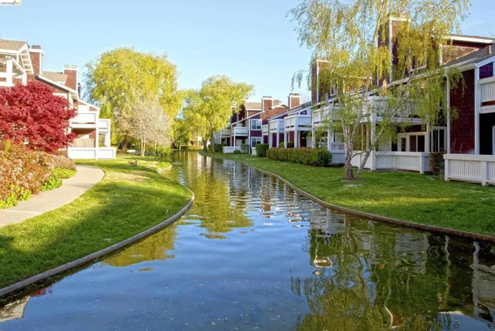 View of community with a water view