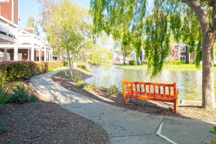 View of home's community featuring a water view