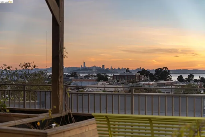Deck at dusk with a balcony