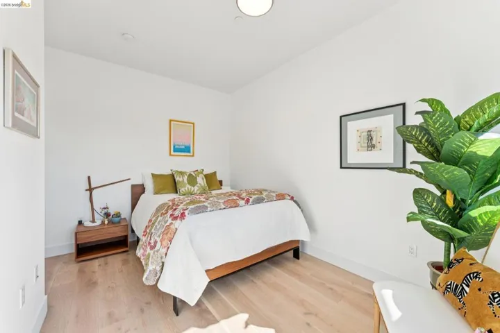 Bedroom with light wood-style flooring