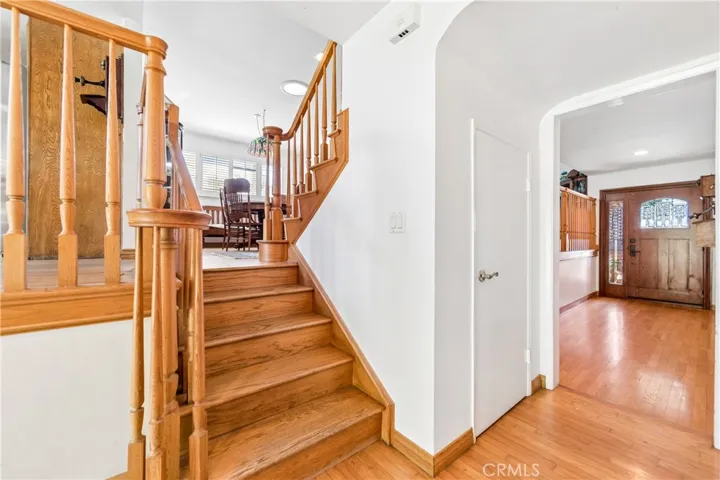 Den Stairs to Kitchen and Dining