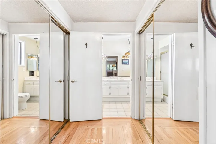 Dual Closets view to Master Bath