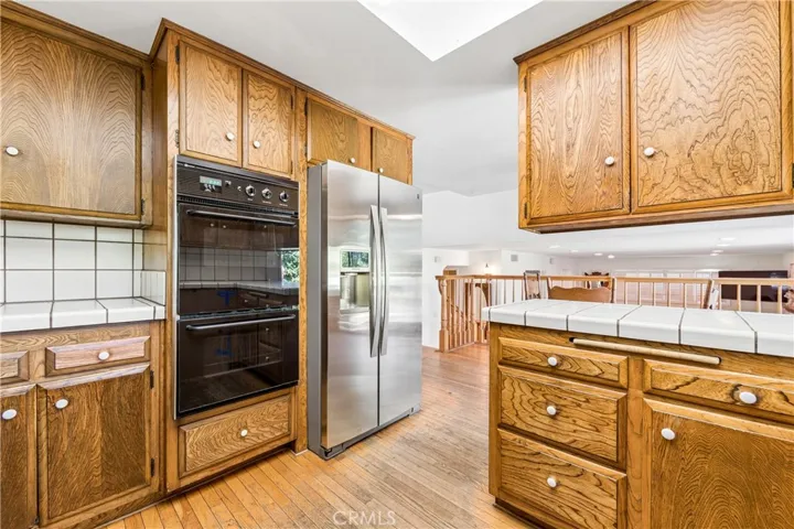 Kitchen w view to Den