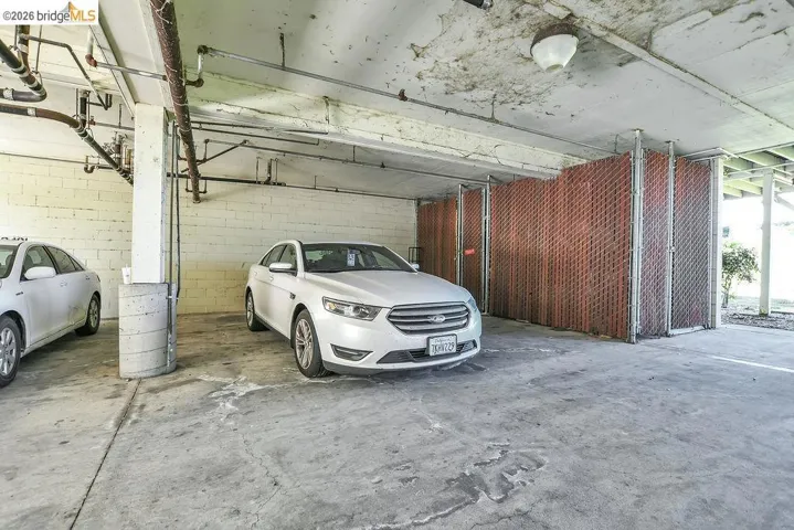 Garage featuring a parking deck