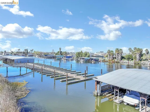 Dock featuring a water view