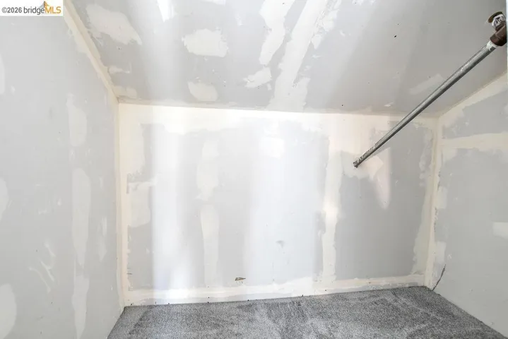 Spare room with carpet floors