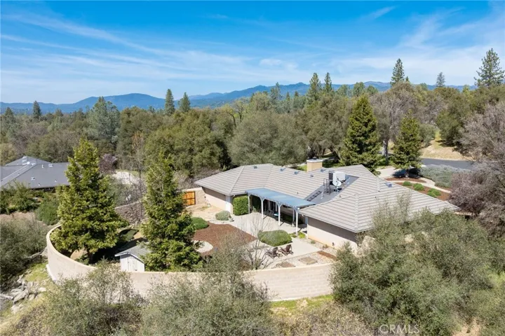 serial view of backyard and home