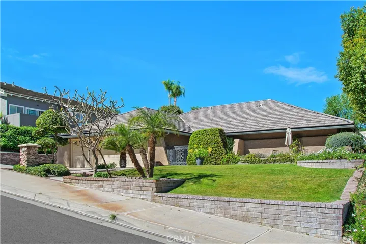This home is situated in the beautiful hills of Canyon Crest with views of the Box Springs Mountains.