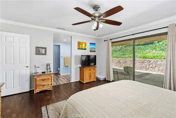 This shows the entrance to the primary bathroom from the bedroom.