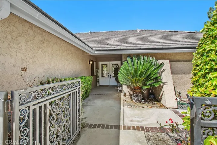 The front courtyard provides privacy and a welcoming environment for your guests as the come to your home.