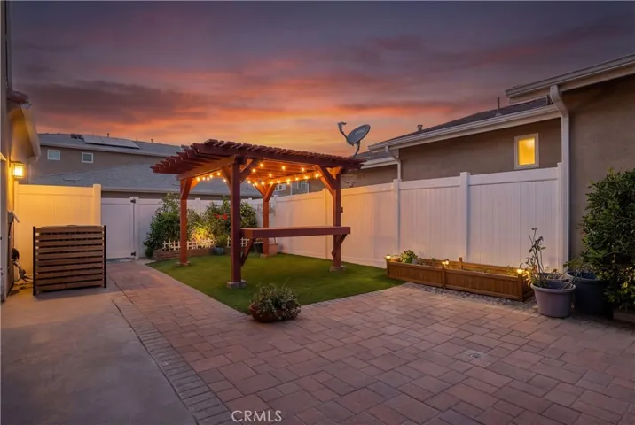 Fenced backyard with gazebo area