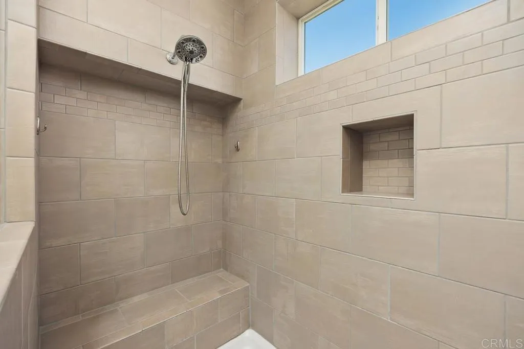 Look at that huge walk in glass shower