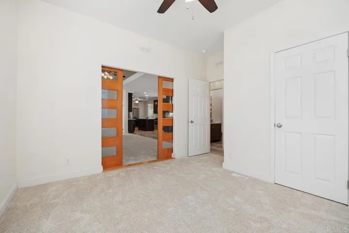 Love this 'barn door" touch:) Perfect room for an office. It's right off the entry and the living rm