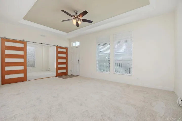 The barn doors add such accent! Looking towrds a bedroom that would make a perfect "in home" office