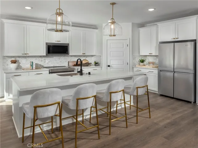 Photo is not of the actual home, but is an inspirational photo of builder’s model home and may depict options, furnishings, and/or decorator features that are not included