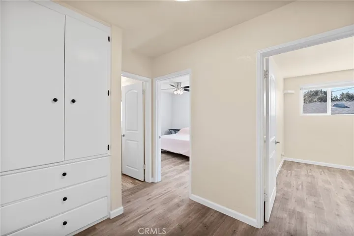 Hallway to main home bedrooms and bath