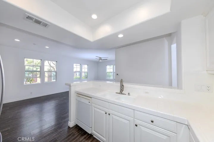 Kitchen looking into living room