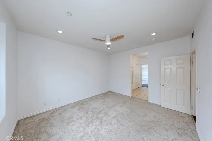 Primary Bedroom - Following photo of primary bedroom is digitally staged