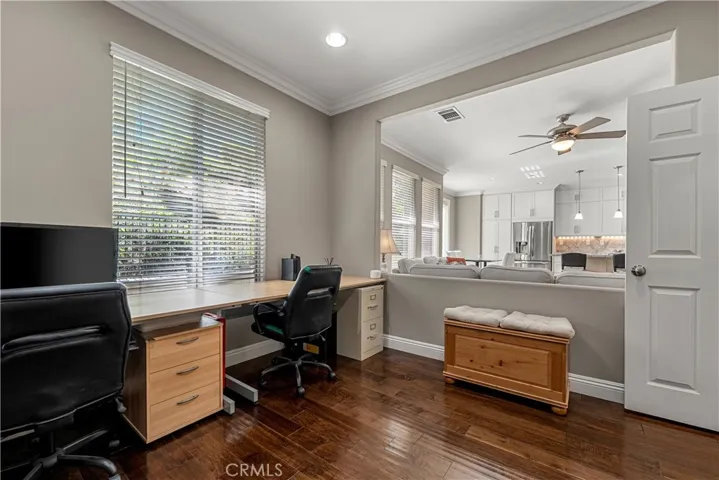 Office/ optional 4th bedroom. Currently the wall is open looking into the family room and kitchen