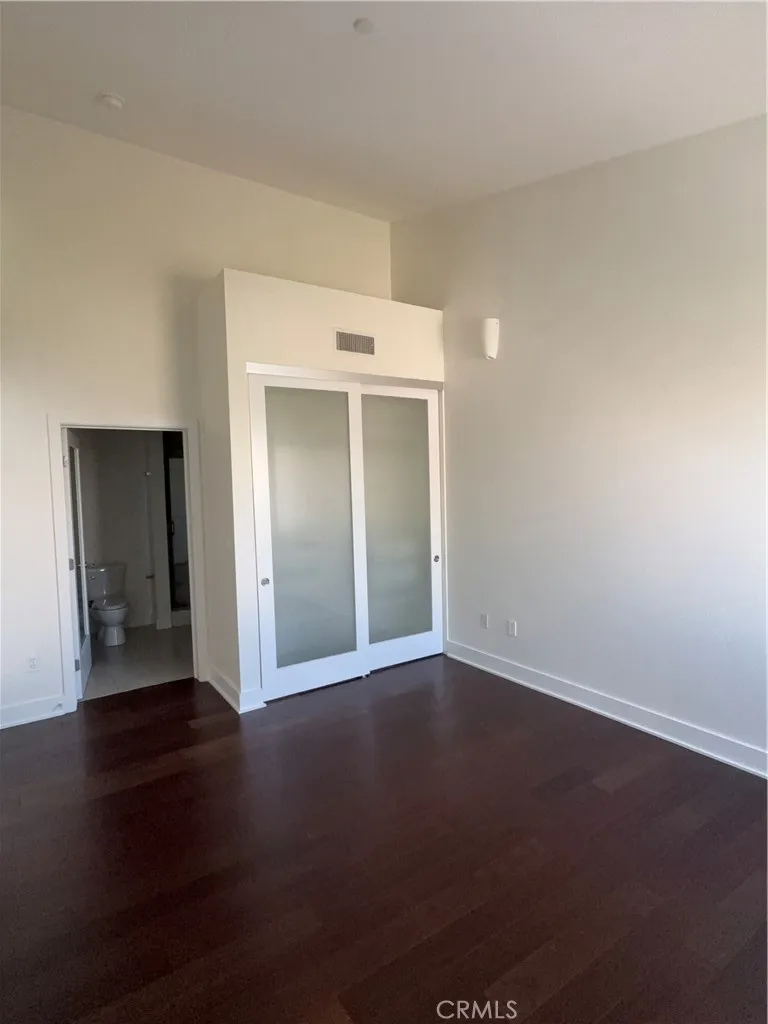 Primary bedroom closet and bath view.