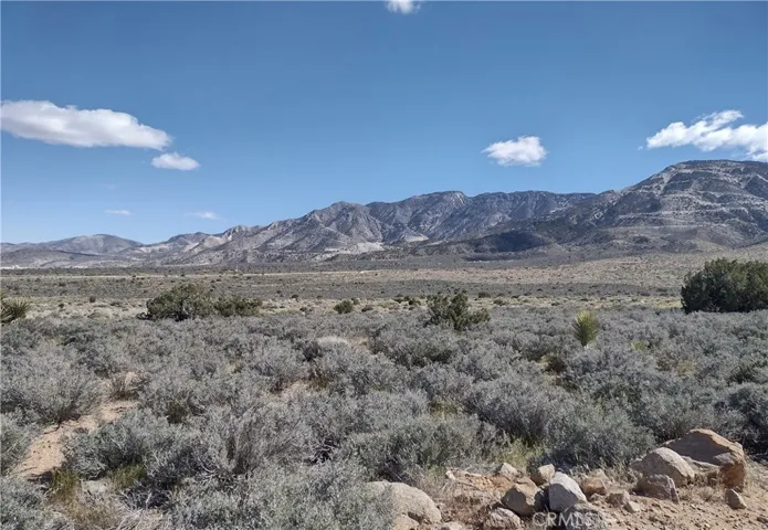 Photo is of property, taken from Mesa Road, looking Southeast