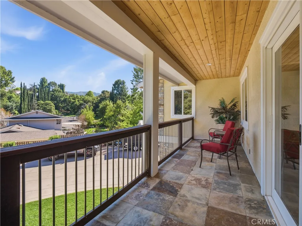 balcony connected to 2 bedrooms