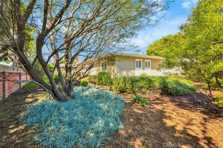 A variety of trees give shade and privacy to the property.