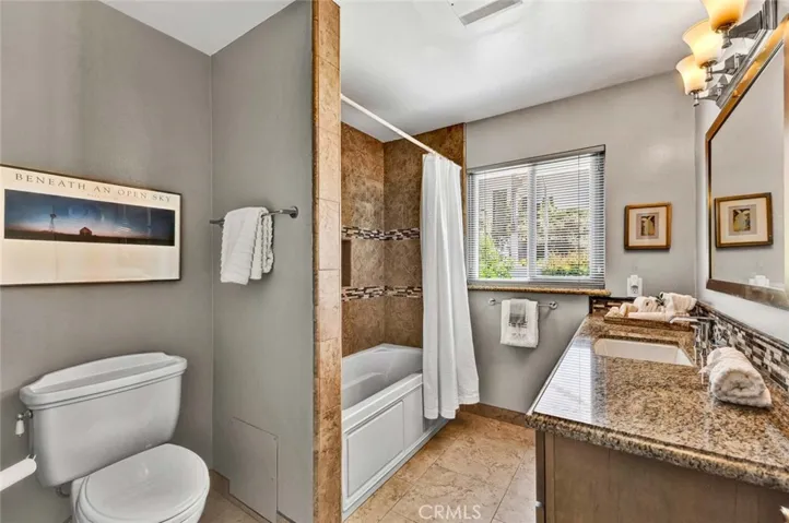 Full hall bath with ADA compliant features.