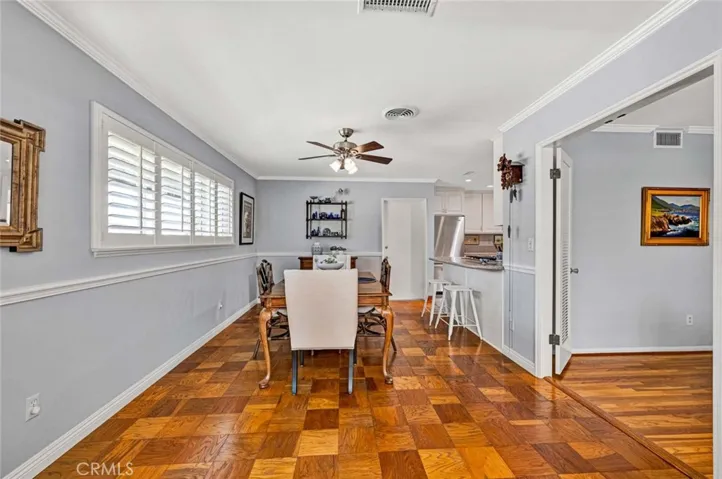 The long formal dining area provides room for extra table seating.