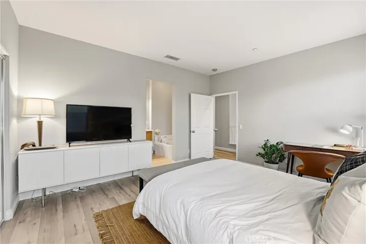 Spacious primary bedroom on the upper level