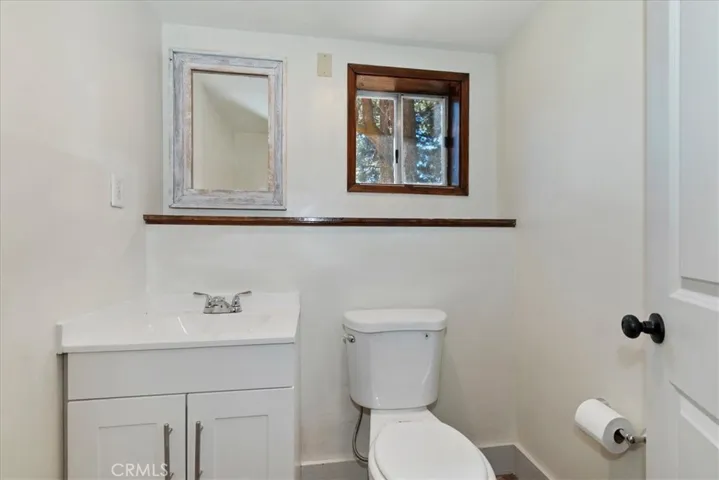 Half bath in BR off garage