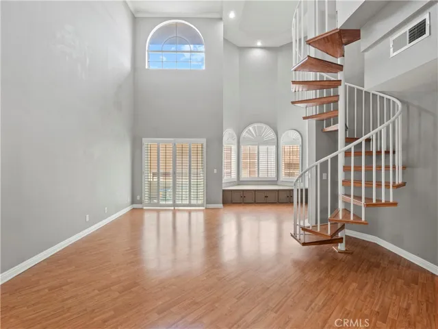 ENTRANCE VIEW OF FRENCH DOOR AND BAY WINDOW