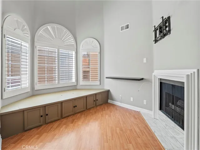 Actual Cozy Bay Window and Fireplace
