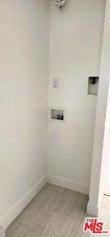 Stackable W/D hookups in each