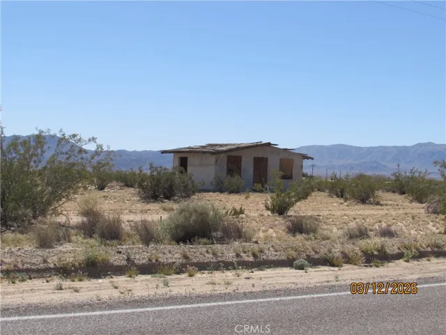 Homestead Cabin is on fifth lot west of Midway Rd on South side