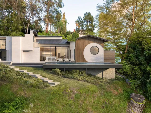 The new design, looking east, with the infinity pool afront. The rendering is a version, but infinity waterfall.