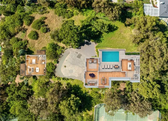 A Top View with the NEW footprint of the 6060sqft home overlaid.
