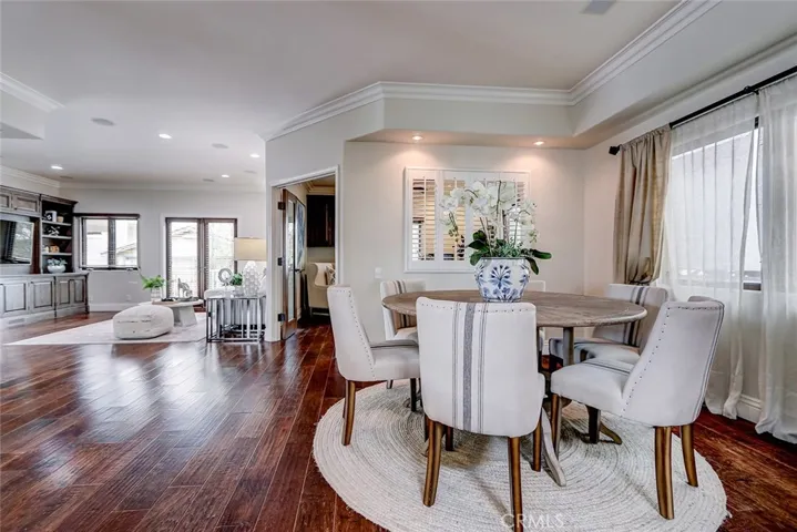 Formal dining room is adjacent to the kitchen and overlooks the family room.