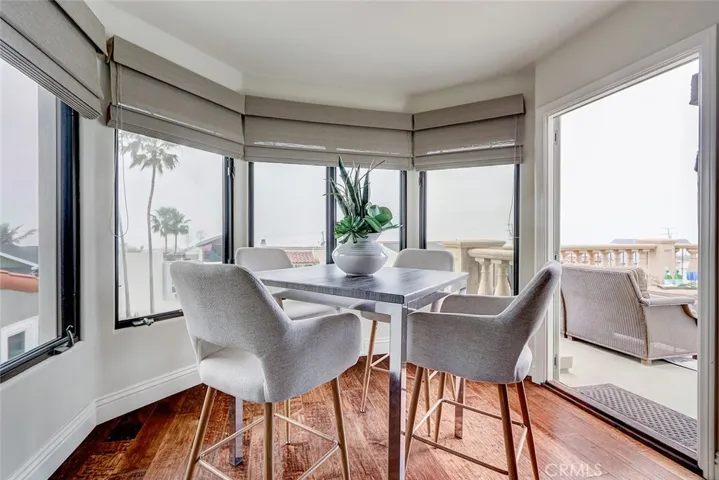 Charming breakfast nook overlooks the ocean and the viewing deck.
