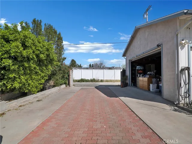 Long Driveway And Large Detached Garage