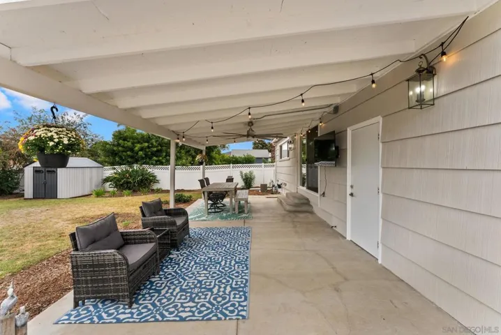 Large yard with cement patio that is covered - perfect for entertaining.