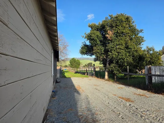 2 driveways. This one goes to the back of the ranch.