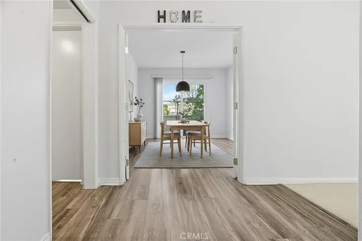 Den (Virtually Staged as Formal Dining Room)