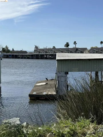 Dock featuring a water view