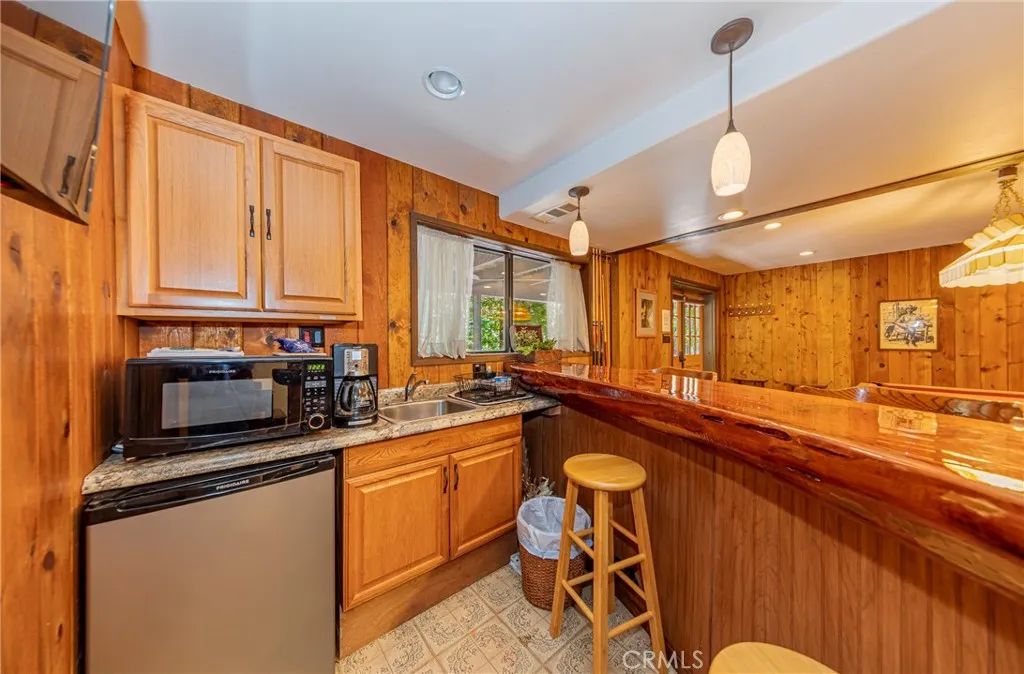 behind the wet bar