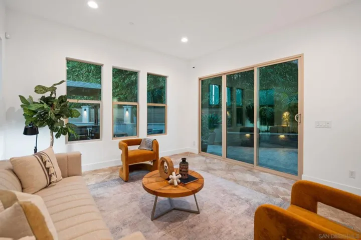 Spacious Living Room w/ Direct Access to the Back Yard