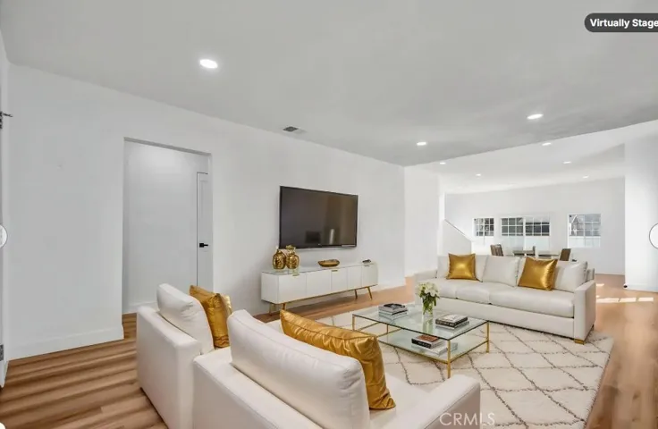 Virtual living room facing hallway and backdoor
