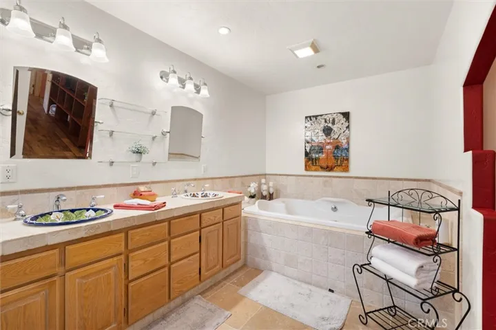 Dual vanity and soaking tub