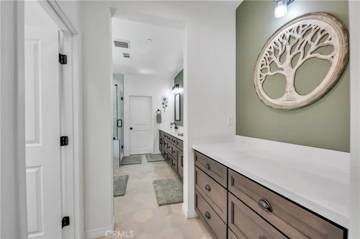 Primary Bathroom additional vanity counter and storage